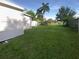 Large backyard with grassy lawn, shed and privacy fence at 1220 36Th W Ave, Bradenton, FL 34205