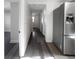 Bright hallway with new flooring and fresh paint at 1220 36Th W Ave, Bradenton, FL 34205
