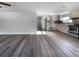 Open living room and kitchen with new flooring at 1220 36Th W Ave, Bradenton, FL 34205