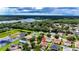 Aerial view of property near lake and neighborhood at 10617 Bamboo Rod Cir, Riverview, FL 33569