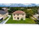 Two-story home's backyard with grass and fence at 10617 Bamboo Rod Cir, Riverview, FL 33569