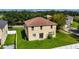 Backyard of two-story house with grass at 10617 Bamboo Rod Cir, Riverview, FL 33569