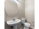 Clean and simple half bathroom with pedestal sink at 10617 Bamboo Rod Cir, Riverview, FL 33569