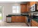 Modern kitchen with stainless steel appliances and ample counter space at 10617 Bamboo Rod Cir, Riverview, FL 33569