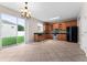 Kitchen with stainless steel appliances and wood cabinets at 10617 Bamboo Rod Cir, Riverview, FL 33569