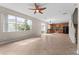 Spacious living room with tile floors and open concept layout at 10617 Bamboo Rod Cir, Riverview, FL 33569