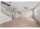 Bright living room featuring tile flooring and a staircase at 10617 Bamboo Rod Cir, Riverview, FL 33569