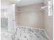 Large walk-in closet with wire shelving and neutral flooring at 10617 Bamboo Rod Cir, Riverview, FL 33569