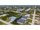 Wide view of property and surrounding neighborhood at 10071 Kingsville Dr, Port Charlotte, FL 33981