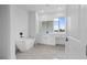 Spa-like bathroom with freestanding tub and vanity at 10071 Kingsville Dr, Port Charlotte, FL 33981