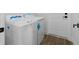 Bright laundry room with new washer and dryer at 10071 Kingsville Dr, Port Charlotte, FL 33981