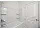 Clean bathroom with bathtub and shower combination at 37513 Williamette Way, Zephyrhills, FL 33540