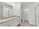 Bathroom with granite countertops and a shower at 7760 Gilchrist Springs Dr, Parrish, FL 34219