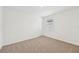 Spacious bedroom with neutral walls and carpet flooring at 7760 Gilchrist Springs Dr, Parrish, FL 34219