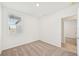 Bright bedroom featuring neutral walls and carpeted floors at 444 Lazy Shore Dr, Nokomis, FL 34275