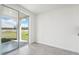 Open dining area with tile floor and sliding glass doors at 184 Lazy Shore Dr, Nokomis, FL 34275