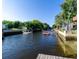 View of the canal with docks and boats at 14914 Capri Ln, Hudson, FL 34667