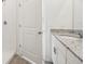 Modern bathroom with shower and granite vanity at 14045 Crutchfield Ct, Parrish, FL 34219