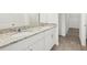 Bathroom with double vanity and granite countertop at 14045 Crutchfield Ct, Parrish, FL 34219