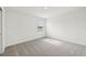Well-lit bedroom with carpet, window, and blinds at 14045 Crutchfield Ct, Parrish, FL 34219