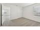 Spacious bedroom featuring carpet floors and a large closet at 14045 Crutchfield Ct, Parrish, FL 34219