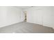 Bright bedroom with carpet, closet, and access to bathroom at 14045 Crutchfield Ct, Parrish, FL 34219