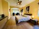 Luxurious main bedroom with king-size bed and walk-in closet at 11909 Mandevilla Ct, Tampa, FL 33626