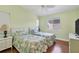 Guest bedroom with two twin beds and hardwood floors at 2521 W Marion Ave # 412, Punta Gorda, FL 33950