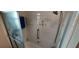 Bathroom with shower/tub combo and seashell decor at 906 Bluewater Dr, Sun City Center, FL 33573