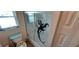 Bathroom with shower/tub combo and mermaid decal at 906 Bluewater Dr, Sun City Center, FL 33573