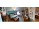Bedroom with a large bed, dresser, and decorative wall accents at 906 Bluewater Dr, Sun City Center, FL 33573