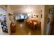 Dining area with a wood table and chairs, open to the kitchen at 906 Bluewater Dr, Sun City Center, FL 33573