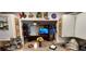 Kitchen with granite countertop and view of living room at 906 Bluewater Dr, Sun City Center, FL 33573