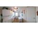Laundry room with washer, dryer, and extra storage cabinets at 906 Bluewater Dr, Sun City Center, FL 33573