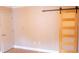 Bedroom with white trim features new floor and modern sliding closet door at 11410 8Th N Way # 310, St Petersburg, FL 33716