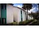 Exterior of the property with well-maintained landscaping and fresh paint at 11410 8Th N Way # 310, St Petersburg, FL 33716