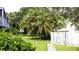 Lush landscaping with mature trees and manicured lawns at 11410 8Th N Way # 310, St Petersburg, FL 33716
