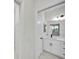 Modern bathroom with white cabinets and quartz countertop at 16229 Cape Horn Blvd, Punta Gorda, FL 33955