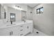 Bathroom with double vanity, shower, and modern fixtures at 16229 Cape Horn Blvd, Punta Gorda, FL 33955