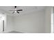 Spacious bedroom with ceiling fan and neutral decor at 16229 Cape Horn Blvd, Punta Gorda, FL 33955