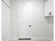 Laundry room with white cabinets and extra storage at 16229 Cape Horn Blvd, Punta Gorda, FL 33955