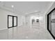 Open living area with kitchen, island, and large sliding glass doors at 16229 Cape Horn Blvd, Punta Gorda, FL 33955