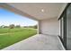 Covered patio with view of the backyard and green space at 16229 Cape Horn Blvd, Punta Gorda, FL 33955