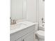 Clean bathroom with gray vanity, white sink, and bathtub at 14006 Ginnie Springs Way, Parrish, FL 34219