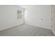 Bedroom with grey carpet, window, and closet at 14022 Ginnie Springs Way, Parrish, FL 34219