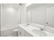 Bright bathroom boasts a double vanity, soaking tub, and shower at 144 Lazy Shore Dr, Nokomis, FL 34275