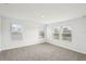 Bright bedroom with neutral walls and carpet at 144 Lazy Shore Dr, Nokomis, FL 34275