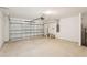 Attached garage with ample space and an automatic door opener at 144 Lazy Shore Dr, Nokomis, FL 34275