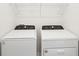 Laundry room with side-by-side washer and dryer at 144 Lazy Shore Dr, Nokomis, FL 34275