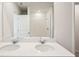 Bathroom with a double vanity and a large mirror at 169 Lazy Shore Dr, Nokomis, FL 34275